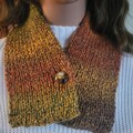U10% Off.  Unique one of a kind warm winter scarf wraps around your neck in the chilly months.  Button to keep your scarf secure. Gift idea.