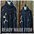 Black knit cowl with an antler and a Perthro rune
